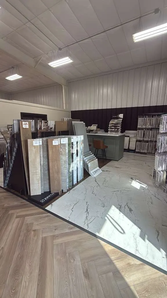 Flooring samples on display in the All About Floors showroom in Forney, Texas