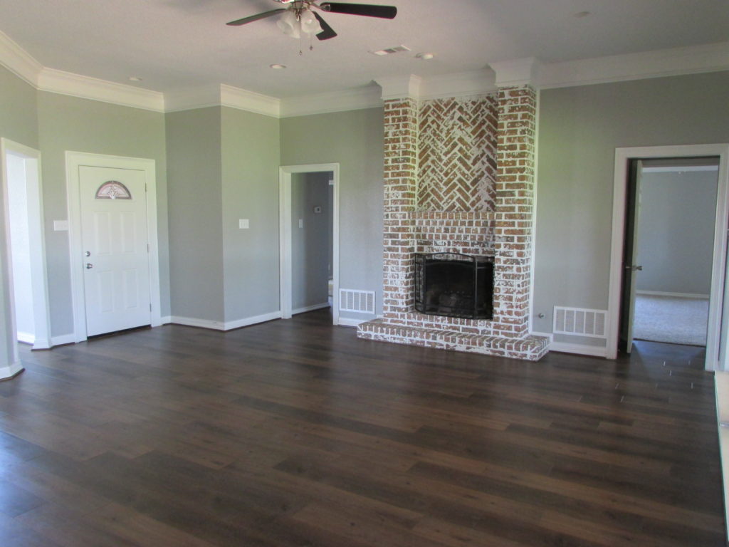 hardwood flooring and fireplace